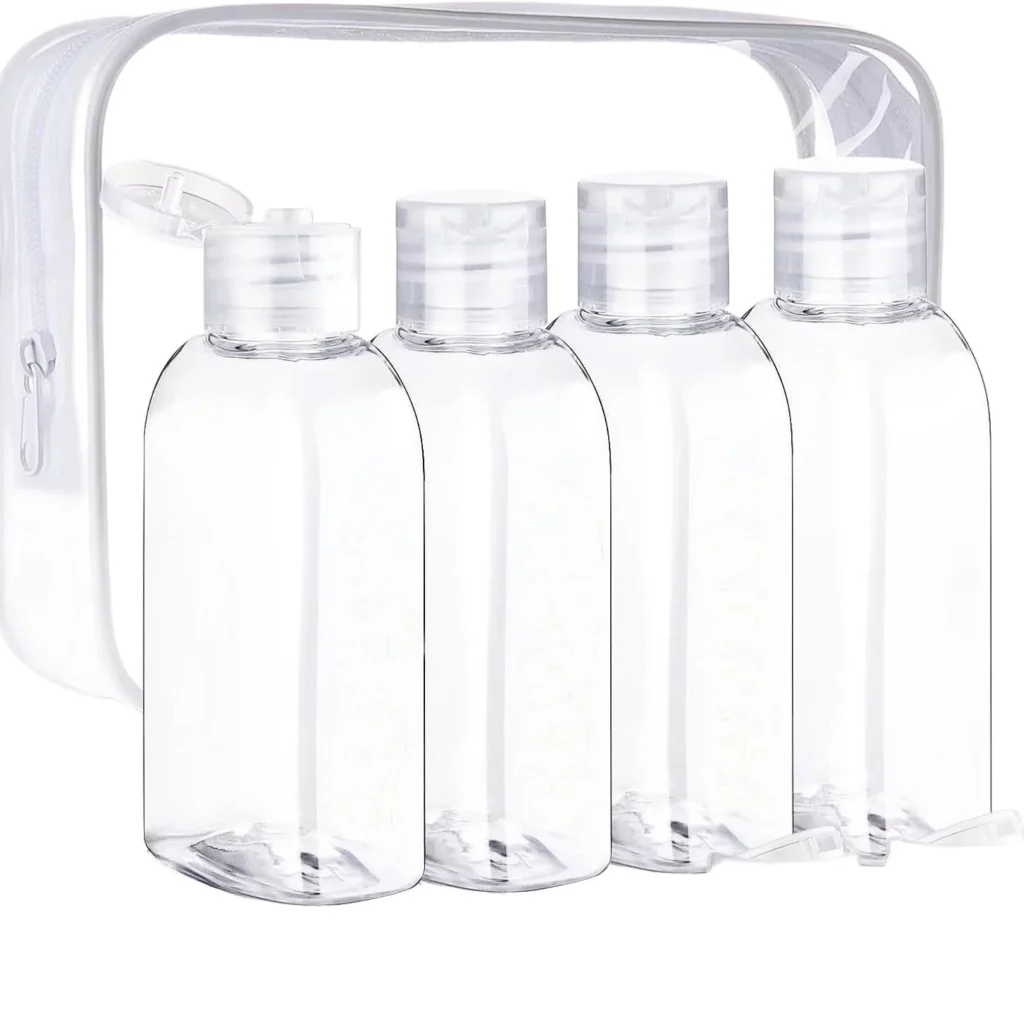 Kit voyage avion, quatre flacons de 100 ml et leur pochette transparente